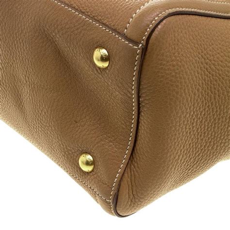 prada vanity case vitello gold tone brown|Prada Vitello Daino Leather Tote .